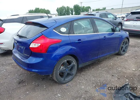 2012 Ford Focus Titanium z USA, uszkodzony, nr VIN 1FAHP3N24CL283473